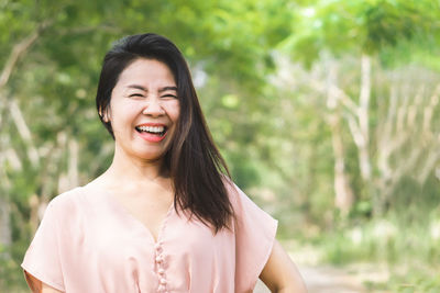 Portrait of a smiling young woman