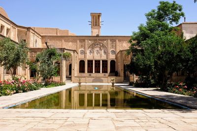 View of swimming pool against building