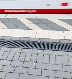 High angle view of zebra crossing on footpath