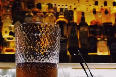 Close-up of beer glass on table