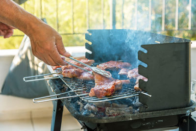 Bbq ribs. ribs fried over an open fire. fire and smoke roll meat