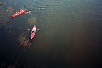 High angle view of people in boats on river