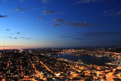 Aerial view of illuminated cityscape