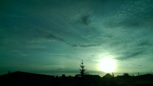 Low angle view of building against sky at sunset