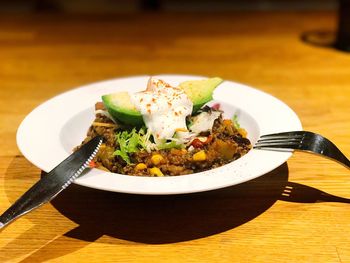 Close-up of served food in plate
