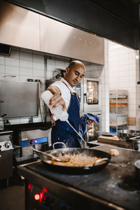 Man preparing food in kitchen