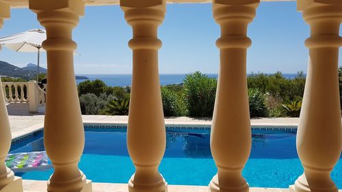 Swimming pool against blue sky