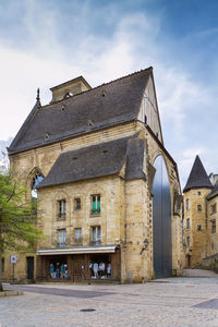 Low angle view of old building against sky