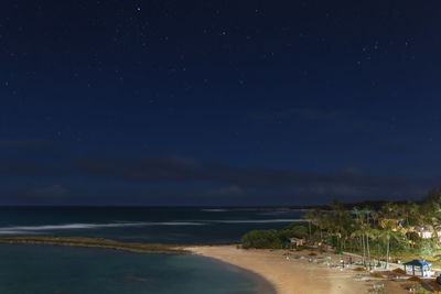 Scenic view of sea against sky at night