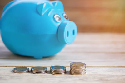 Close-up of coins on table