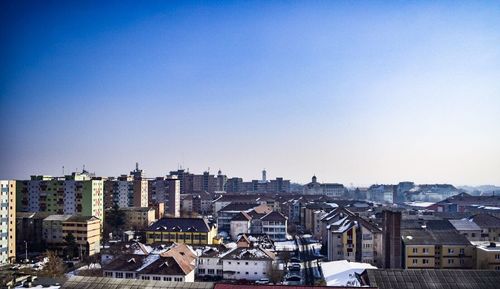 Cityscape against clear sky