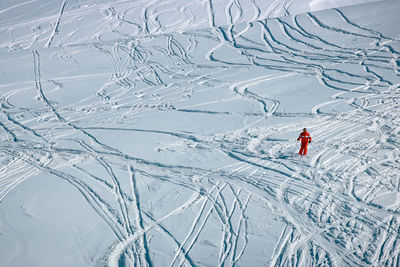 High angle view of man skiing on snowcapped mountain