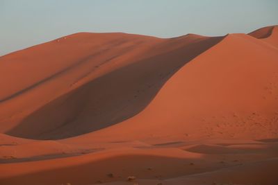 Scenic view of desert against sky