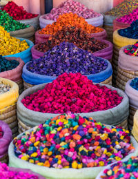 Multicolored dried flowers on sale in the souks of marrakesh's medina in morocco