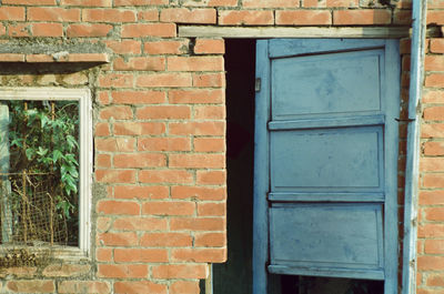 Brick wall with closed door