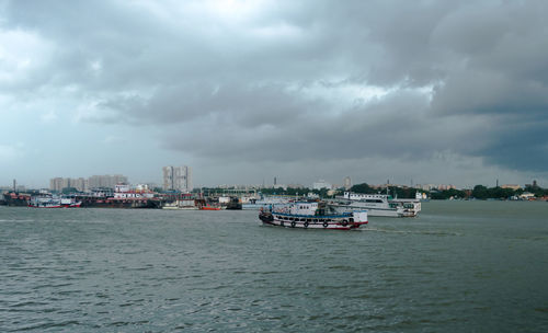 Dramatic clouds over ganges river horizon on a dark cloudy day. view from babu ghat. kolkata