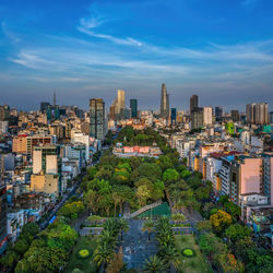 High angle view of buildings in city against sky