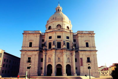 Low angle view of cathedral against blue sky