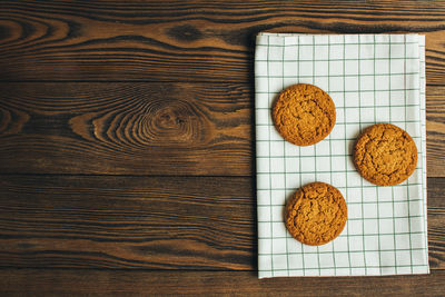 Directly above shot of cookies on wooden table
