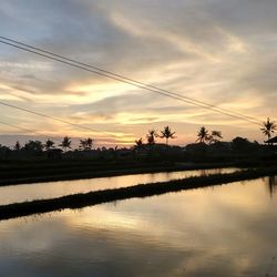 Scenic view of silhouette landscape against sky during sunset