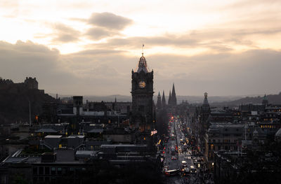 Edinburgh in the dusk with busy traffic on the princes street