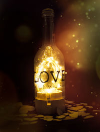 Close-up of illuminated lantern on table