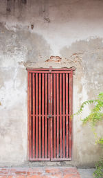 Red door and brick wall, asian style