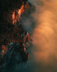 View of rock formation against sky during sunset