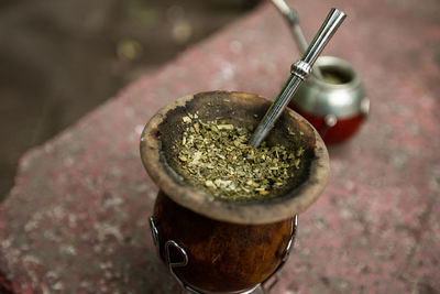 High angle view of drink in container on table