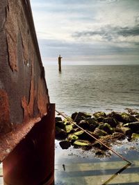 View of sea against cloudy sky