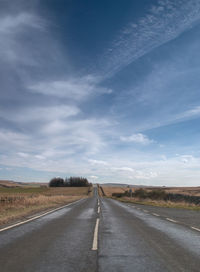 Empty road against sky