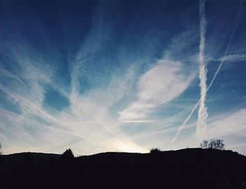 Scenic view of landscape against blue sky