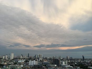 High angle view of buildings against sky during sunset