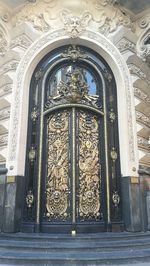 Low angle view of ornate window