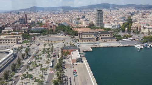 High angle view of road by buildings in city