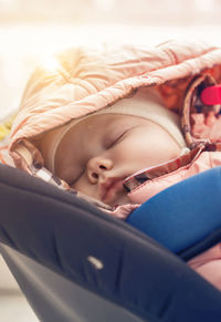 Portrait of cute baby girl lying down