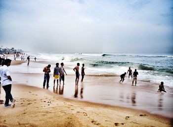 People enjoying at beach