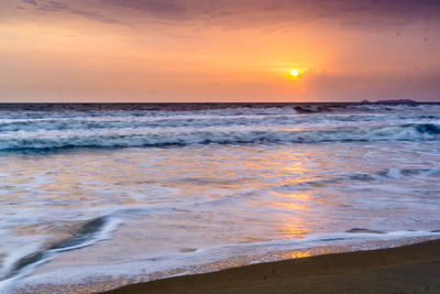 Scenic view of sea during sunset