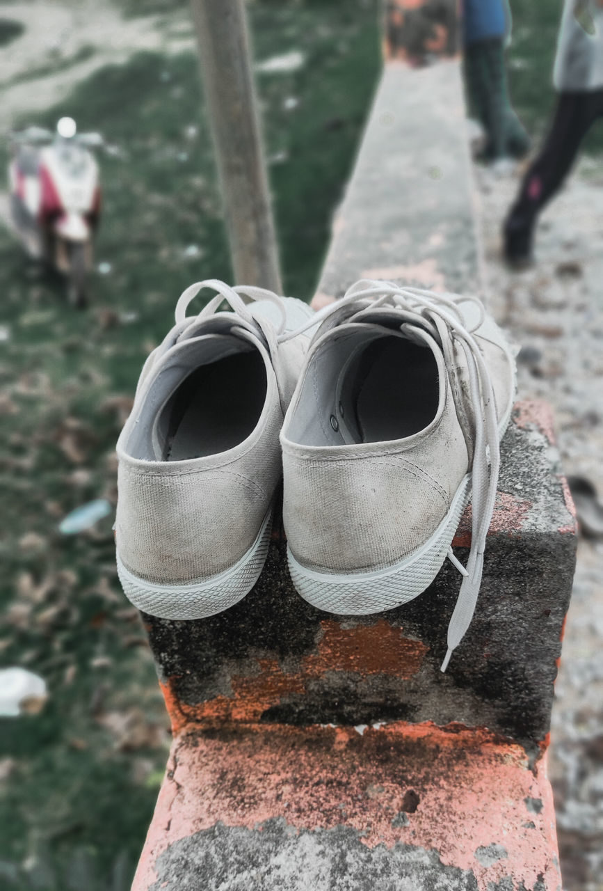 footwear, spring, shoe, focus on foreground, day, red, outdoors, close-up, nature, clothing, human leg, adult