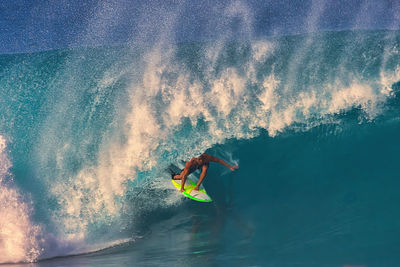 Man surfing in sea