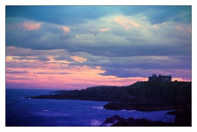 Scenic view of sea at sunset