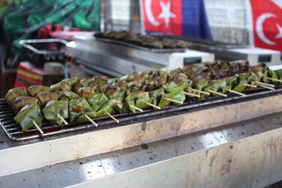 Close-up of malaysian food for sale at market stall