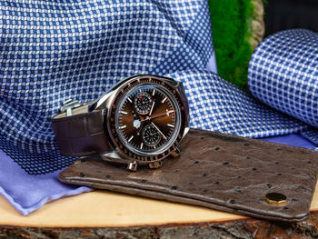 High angle view of clock on table