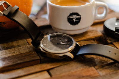 High angle view of clock on table