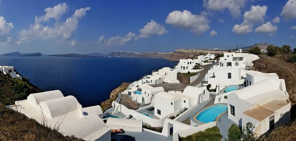 Panoramic view of town by sea