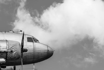 Low angle view of airplane against sky