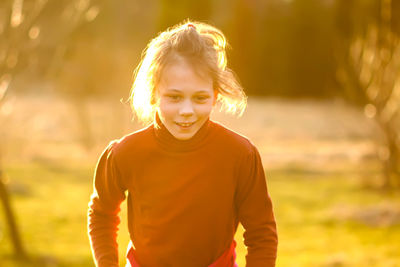 Portrait of girl standing outdoors