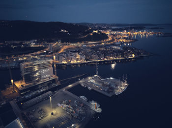 High angle view of illuminated city at night