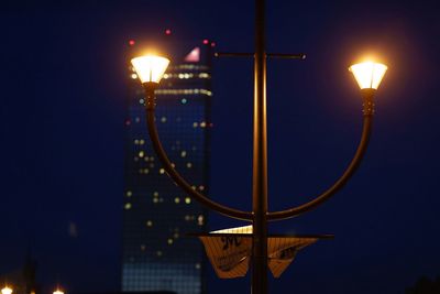 Low angle view of illuminated street light