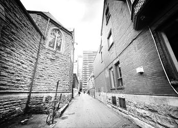 Narrow alley along buildings